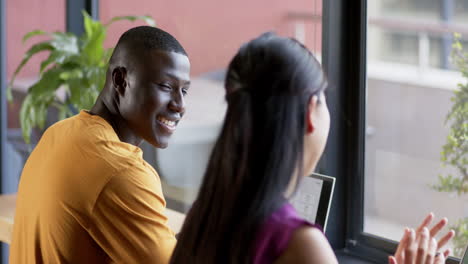 casual diverse business people talking working together in office, slow motion, copy space