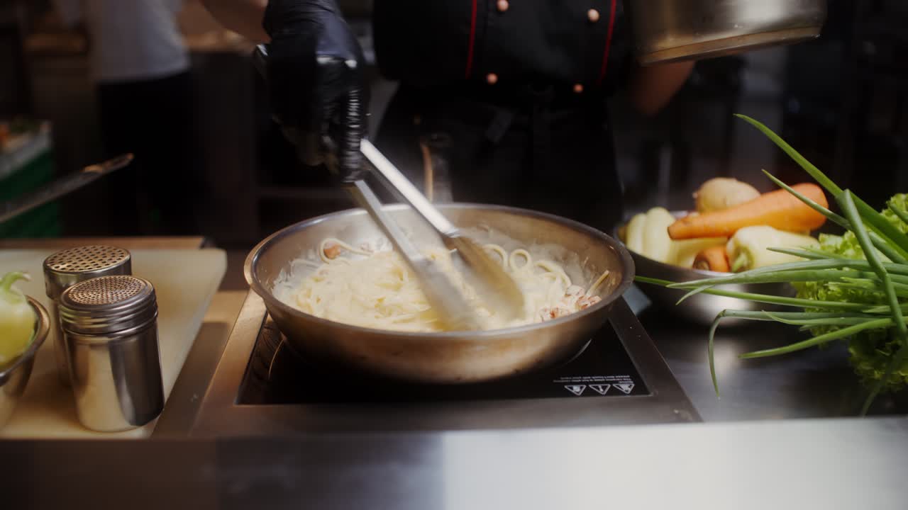 Chef Cooking Creamy Pasta