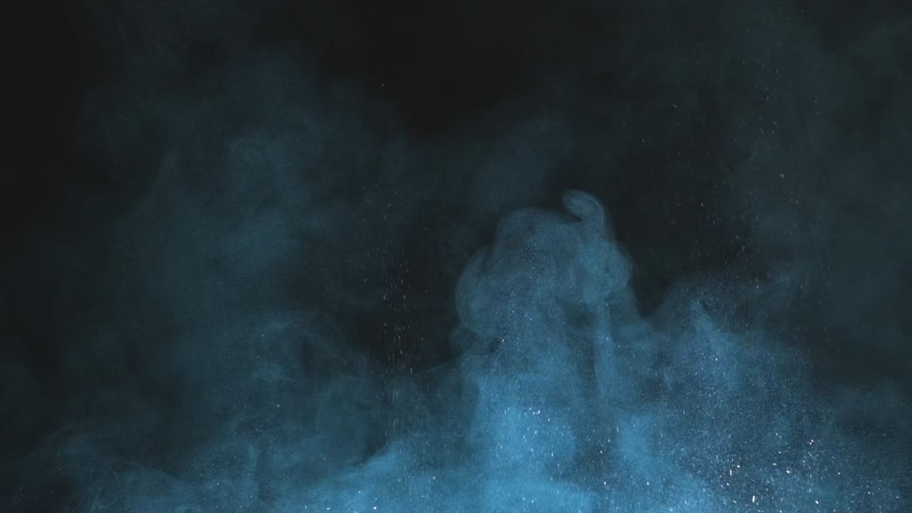 la onda de explosión de las partículas brillantes azules en cámara lenta