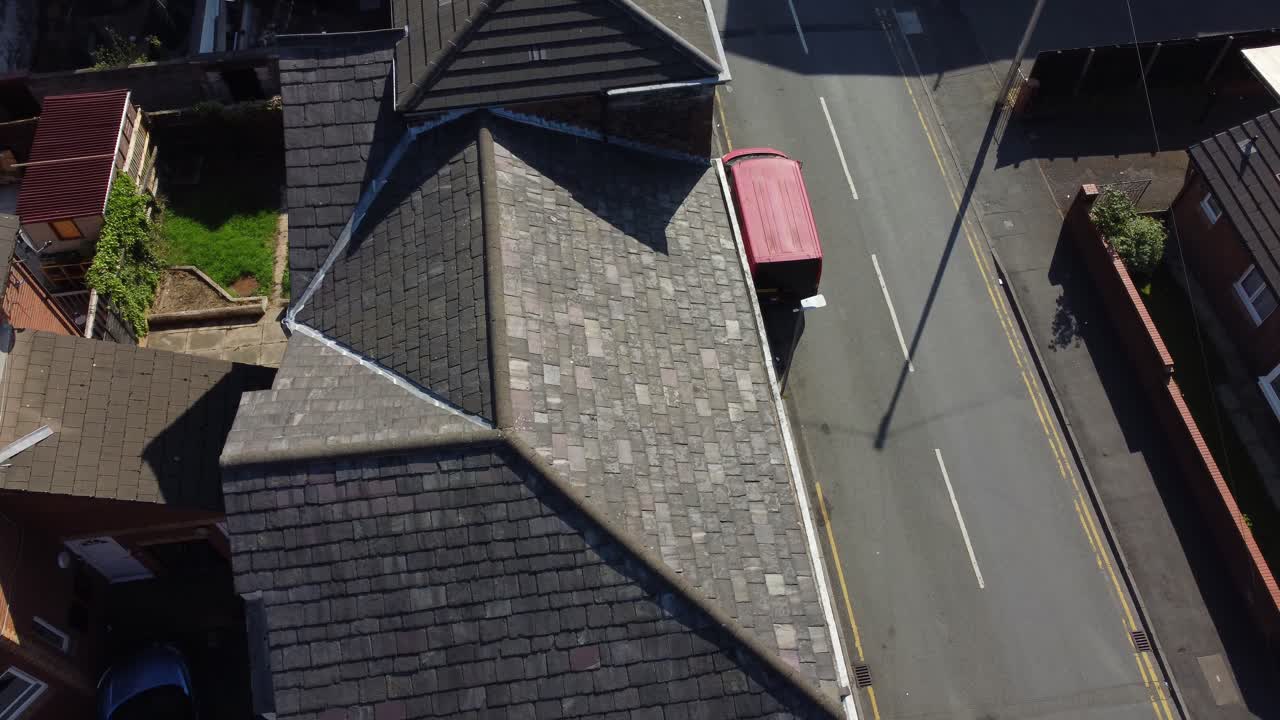 Rooftop surveyor aerial view inspecting damage and repair of real estate for homeowner