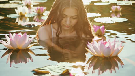 serene woman in a lotus pond