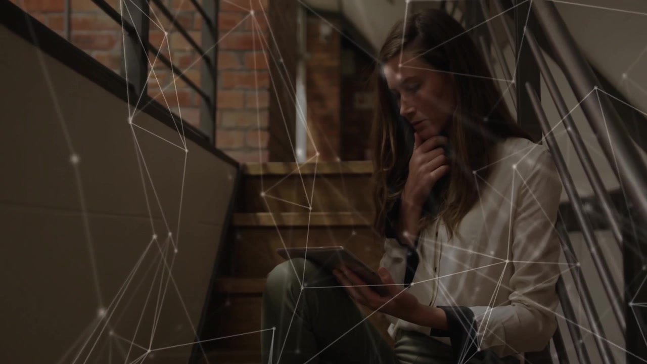 Woman tapping and scrolling tablet on staircase, analyzing tech data via animated network overlay