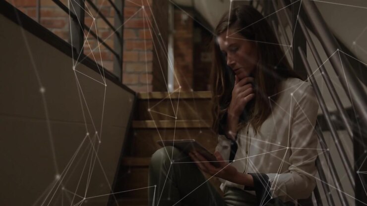 Woman tapping and scrolling tablet on staircase, analyzing tech data via animated network overlay