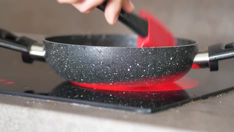 cooking in a pan on a hot plate