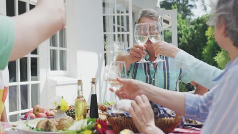 happy family eating together at table