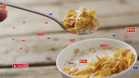 animation of spoonful of cereal with milk, surrounded by play and subscribe icons