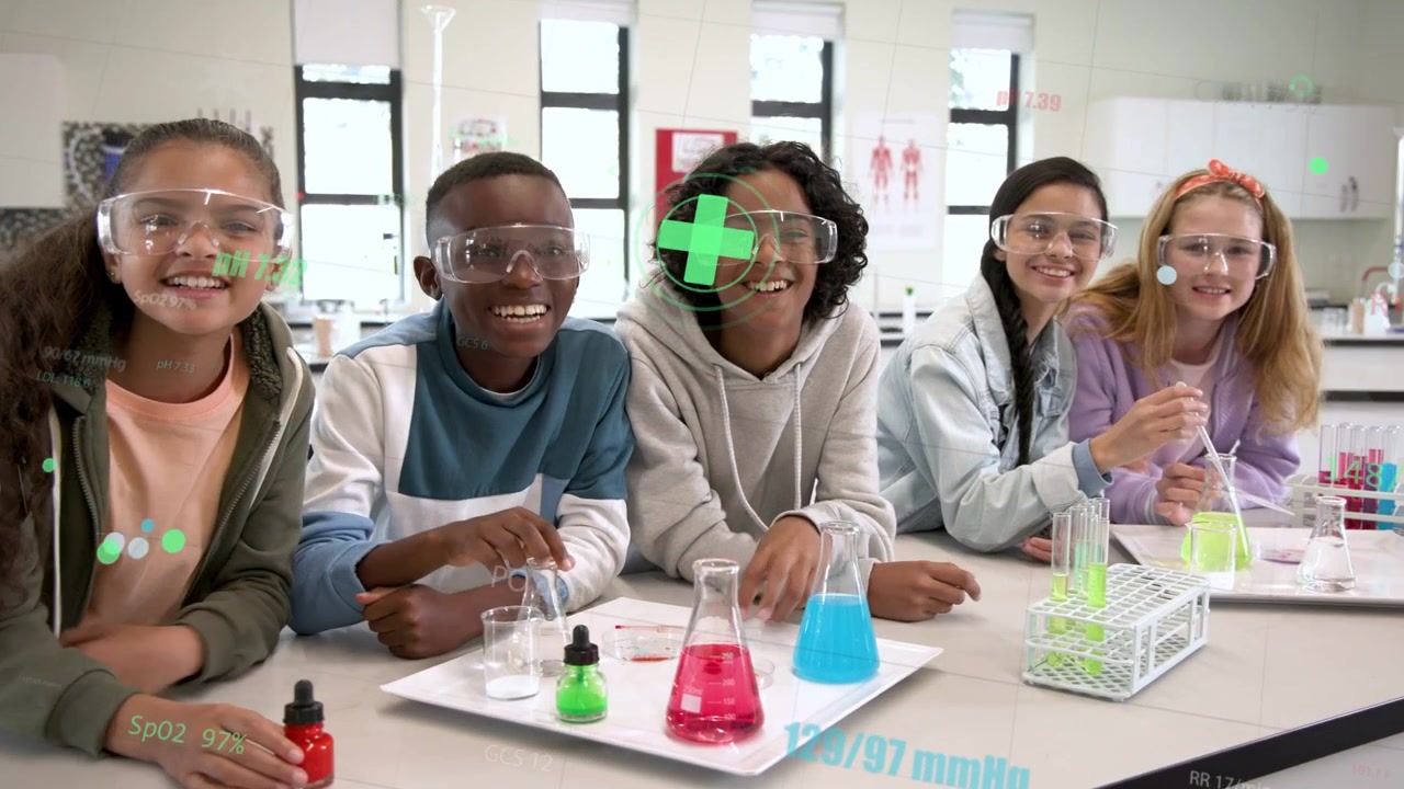 Left student squeezing dropper, group mixing flasks and tubes, observing color change for science