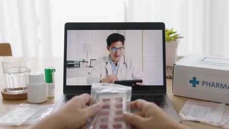 close-up telehealth consult platform with rx pill drug on table.