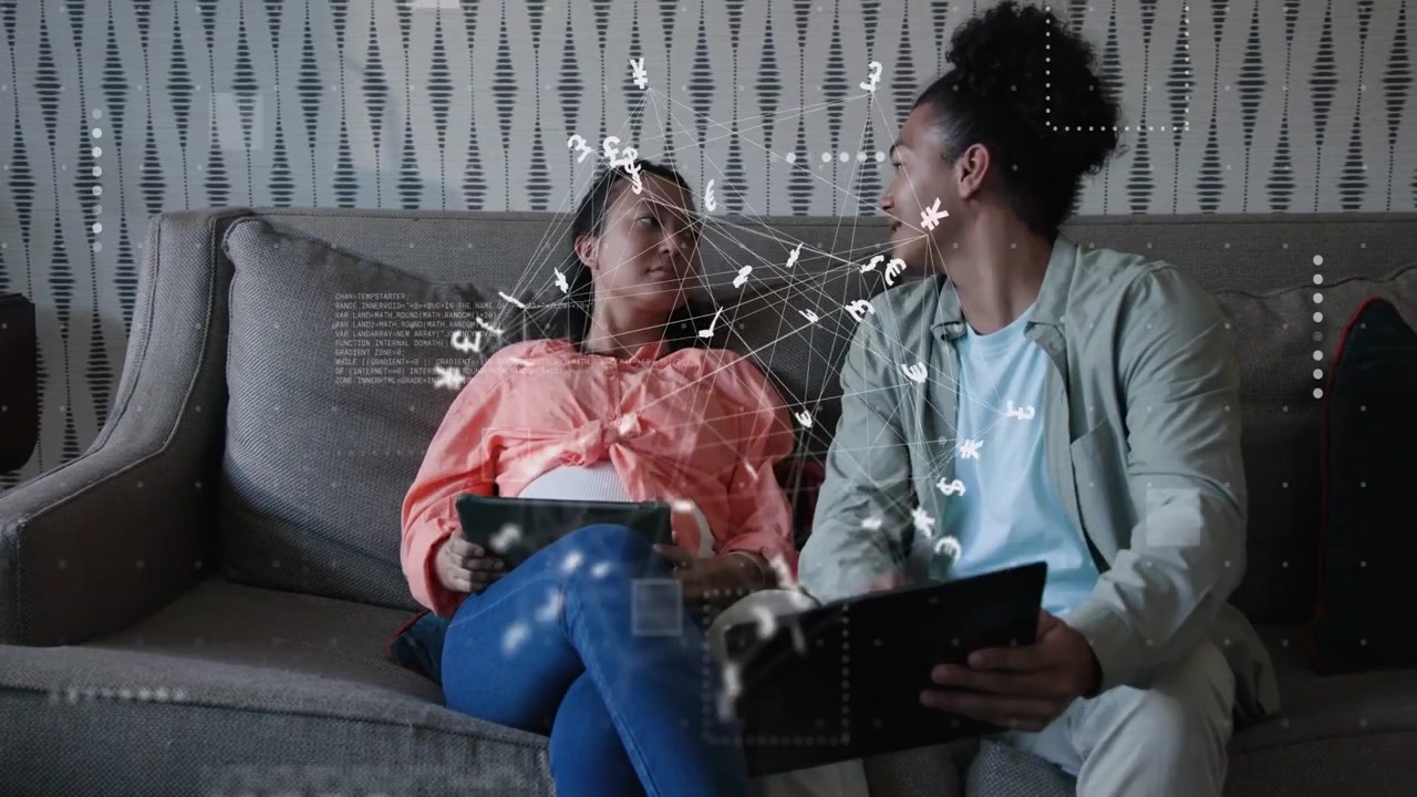 Man turning tablet and pointing, couple leaning and reviewing finance with network currency overlay