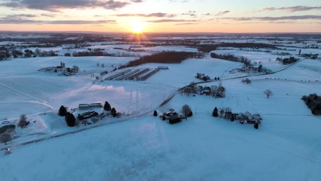 winter snow covers rural country fields in northeast usa