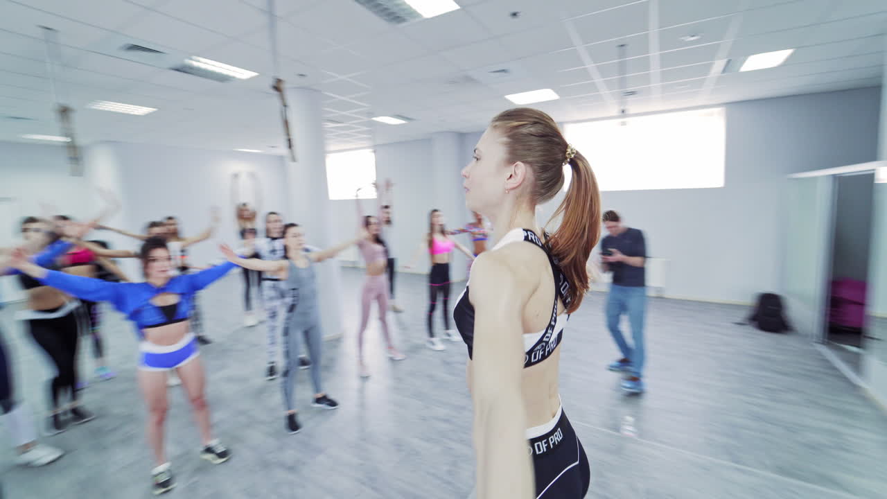 Completion after team work. Happy fitness class completing exercise session