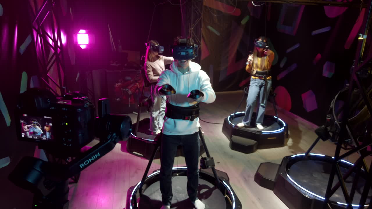 Camera filming a boy playing with a Virtual Reality headset