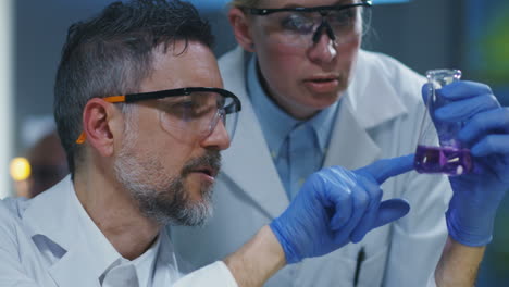 scientists analyzing a sample in a laboratory