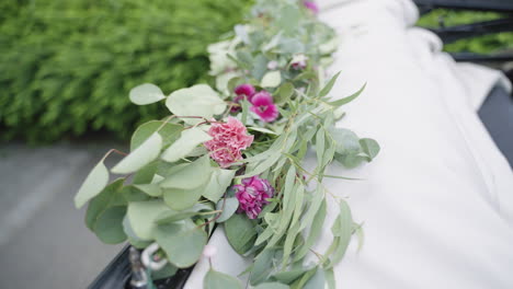 Flower-arrangement-on-a-vintage-car