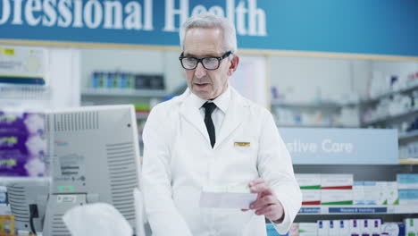 face, pharmacist and senior man with a box