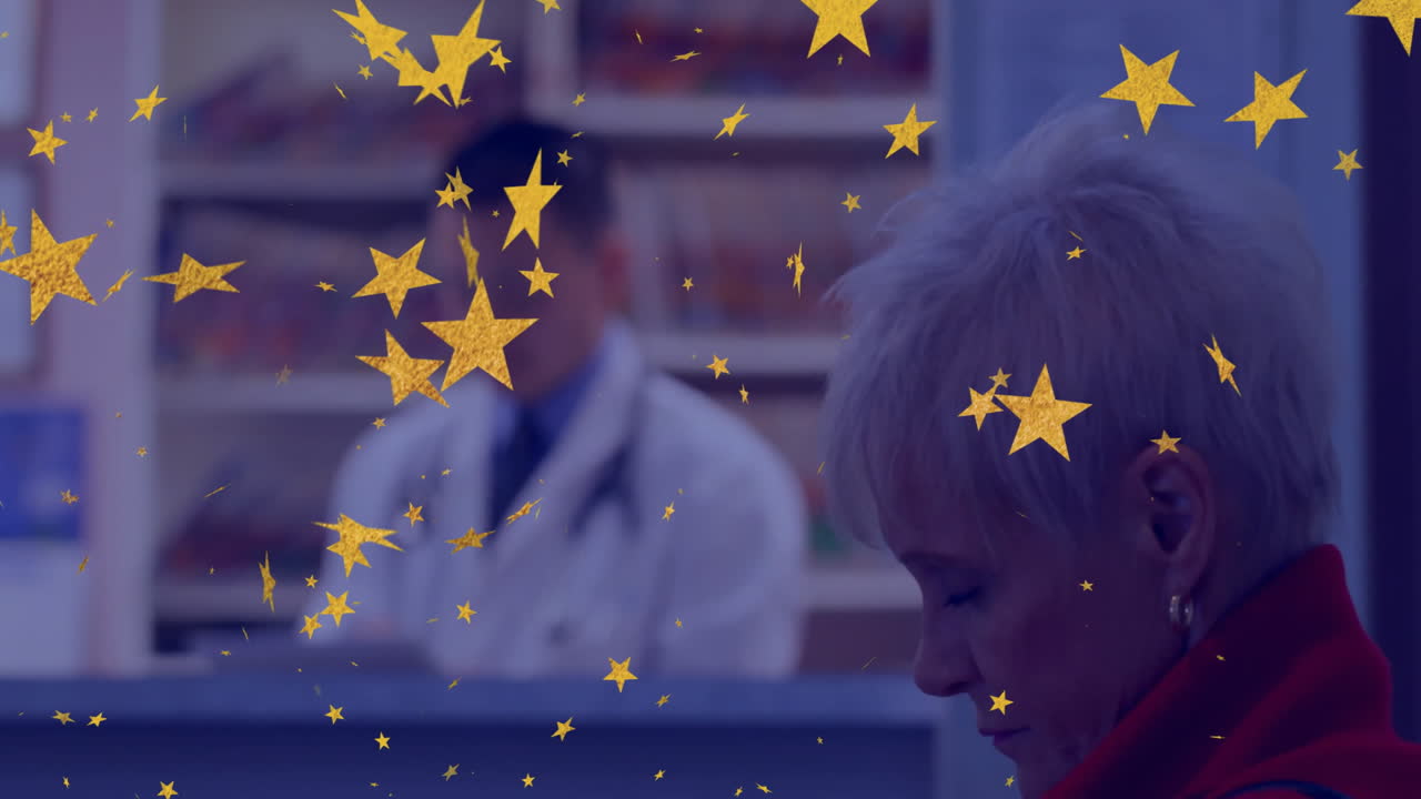 Patient sitting, doctor standing with stethoscope by desk showing golden stars in medical reception