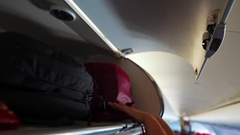 finding space for your carry-on luggage on the plane