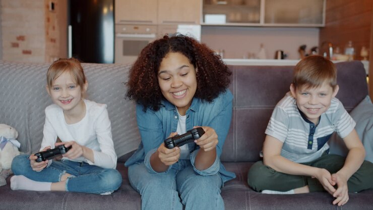 Happy Children Playing Video Games Together