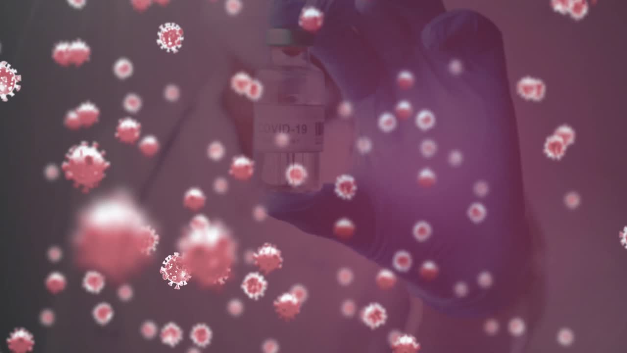 코로나19 백신을 가진 의사의 중간 부분에 떠다니는 여러 코로나19 세포