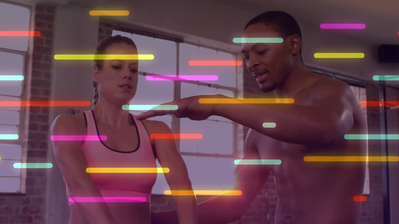 Fitness coach aligning, releasing hand while woman lifting kettlebell for form, neon bars overlay