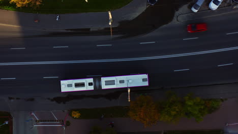 establishing aerial drone shot top down view of a bus, cluj-napoca, iulius mall zone