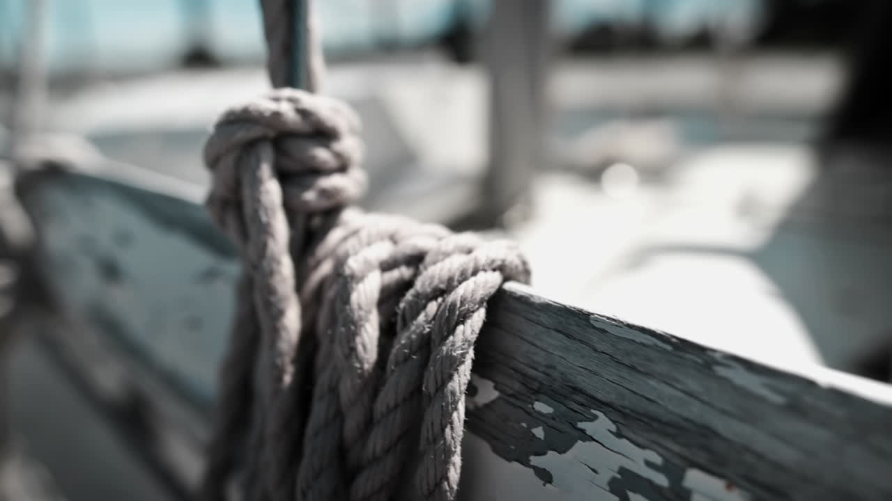 Old Weathered Rope And Peeled Paint Of An Old Boat - close up