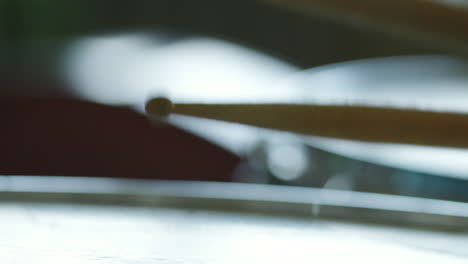 close-up abstract view of drumsticks