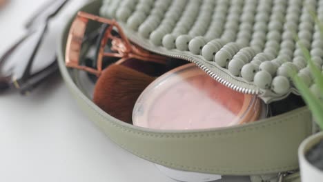 makeup bag with cosmetics and accessories