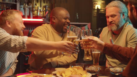 Men-Celebrating-Something-In-Pub