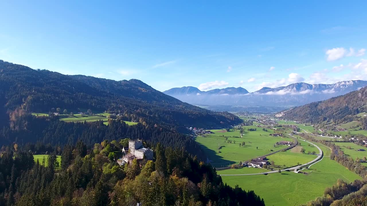 AERIAL, flight with the DJI Phantom 4 in Tyrol, wonderful view over the Brixental in direction Inntal with the castle and the church from Itter..