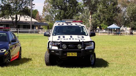 police truck in a field