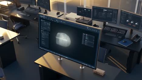 fingerprint biometric data analysis on a computer monitor in a high-tech office