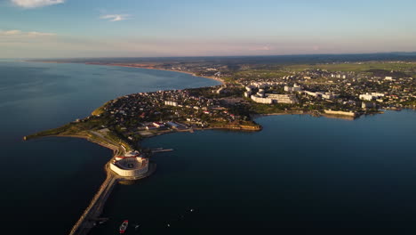 aerial view of a coastal town with fortress