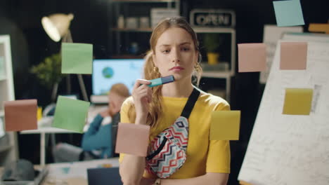 attractive woman analyzing data on board