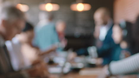 blurred cafe with customers in busy coffee shop bustling with activity background copy space intro 4k footage