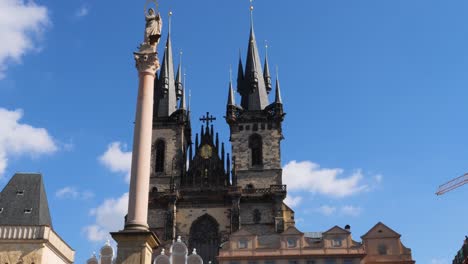 marian column in the old town square and the church of our lady before týn in prague, czech republic