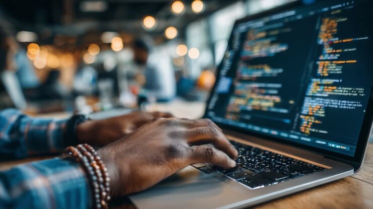 A Focused Programmer Engaged in Coding at a Modern Workspace, Showcasing the Art of Software Development with Attention to Detail and Surrounding Creativity