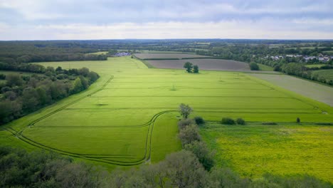 land of forest and agriculture fields in france, aerial drone view