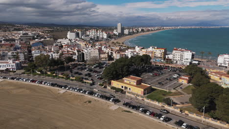 evening light on playa sur beachfront and rooftops in peniscola, spain