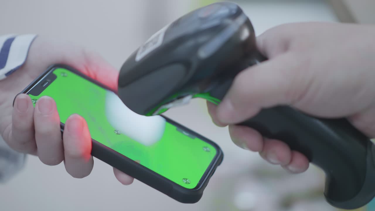 Scan and pay for purchases with a mobile phone in the supermarket