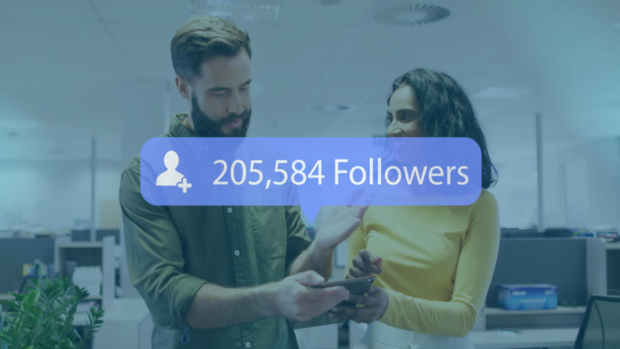 Discussing social media growth, man and woman analyzing animation in office space