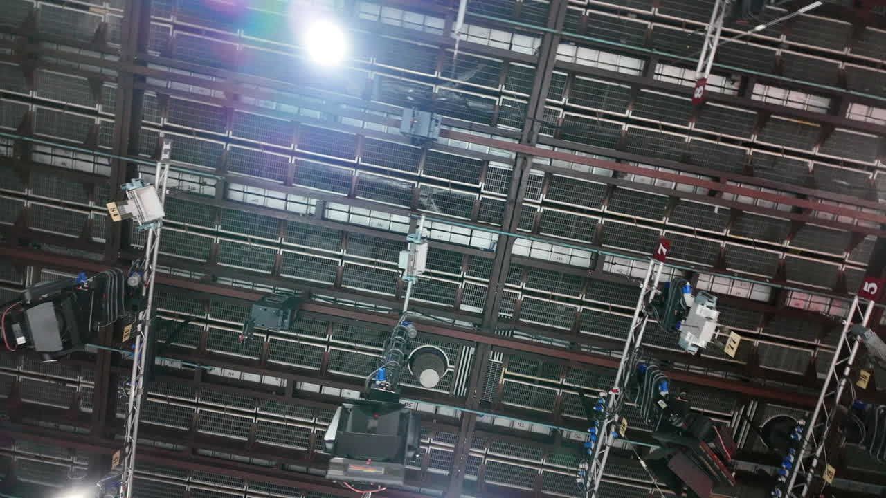 Flashing studio lights equipment on the ceiling of a TV set