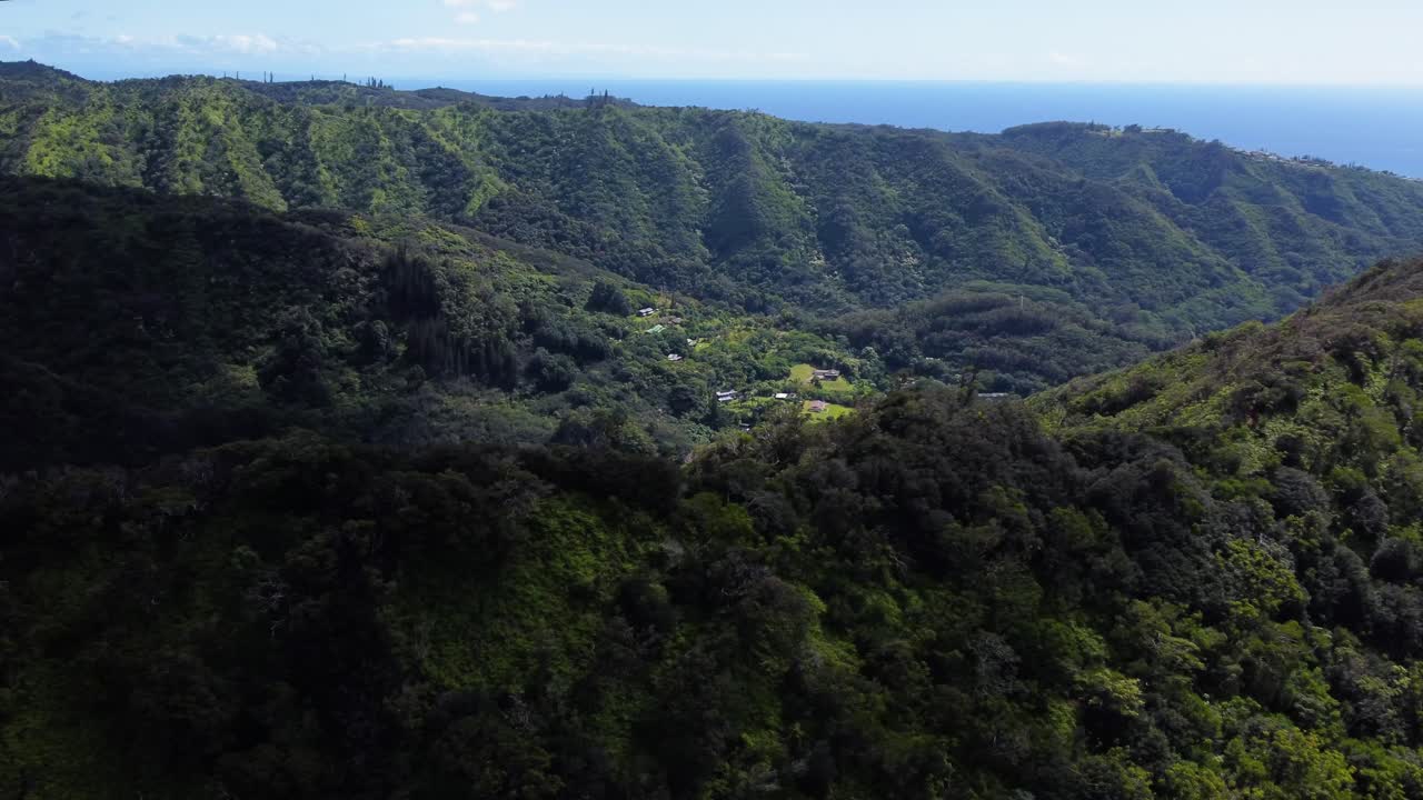 AERIAL Side Panning Shot of a Mountain Ridge in the Jungles of Oahu, Hawaii