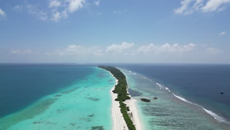 sky blue island lagoon and tropical beach paradise in dhigurah, maldives