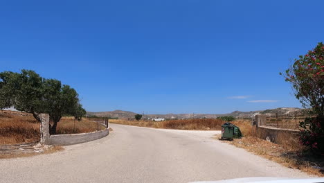 view in front of a greek rental car