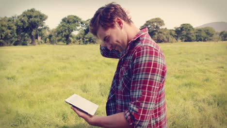 handsome hipster using tablet