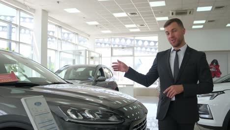 a pleasantlooking young salesmanconsultant in a bu 4k 2025 08 04 04 31 21 utc.mov | auto, automobile, automobile industry, business person