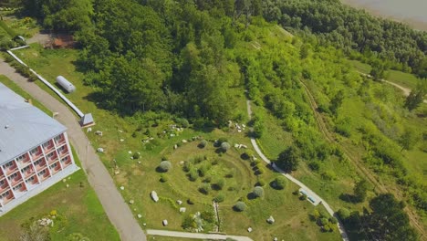 newlywed-couple-walks-in-park-on-cascade-hill-bird-eye-view