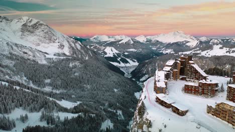 avoriaz ski resort at sunset in french alps, 4k winter aerial landscape