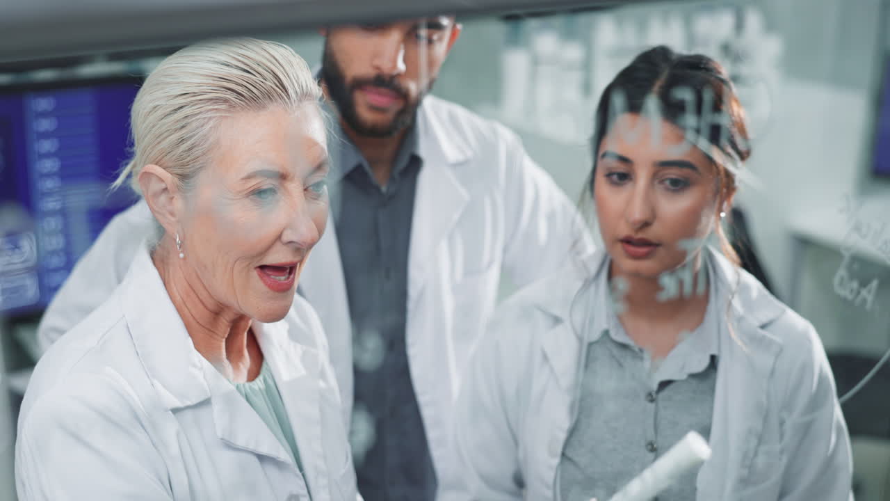 Scientists collaborating in a lab